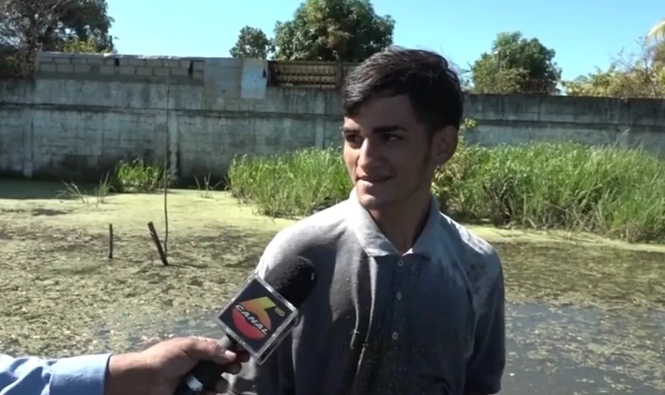 Patio de colegio en colonia Rivera Hernández convertido en pozo de tilapia